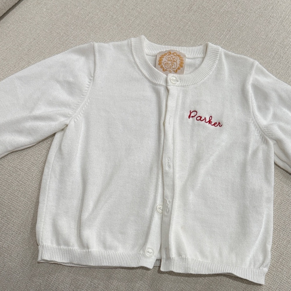 The Beaufort Bonnet Company White Cardigan with Red “Parker” Embroidery